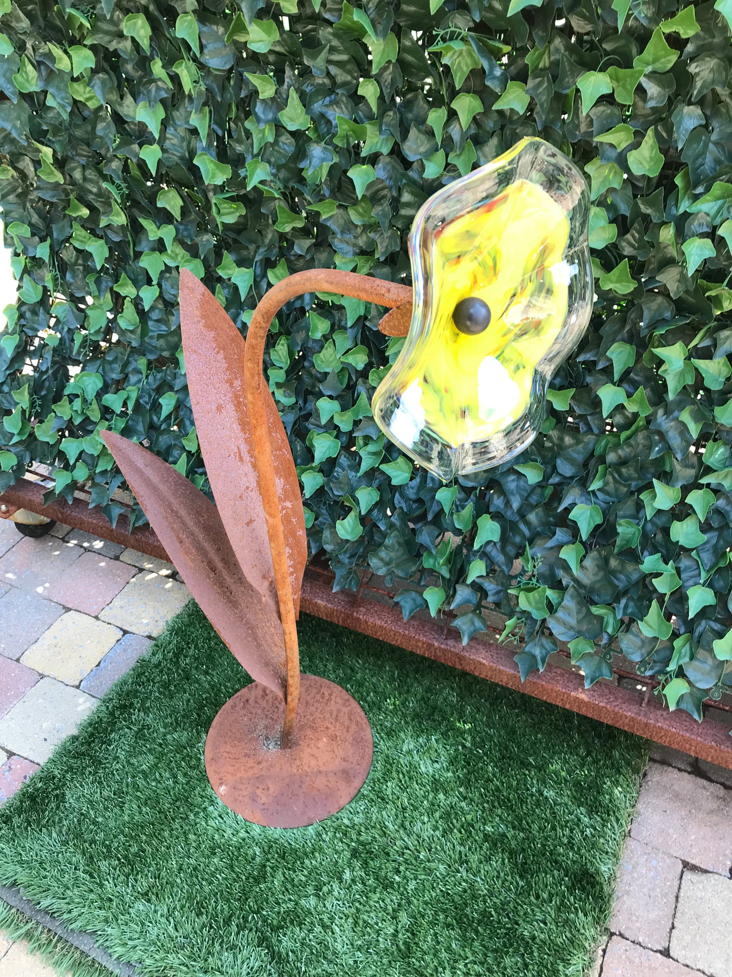 Kelkbloem , voorzien van 1 glazen bloem